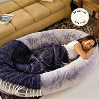 Girl sleeping in arctic grey human dog bed with 30 day risk free trial