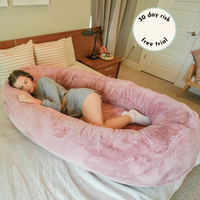 Girl sleeping in Pink Plufl Human Dog Bed