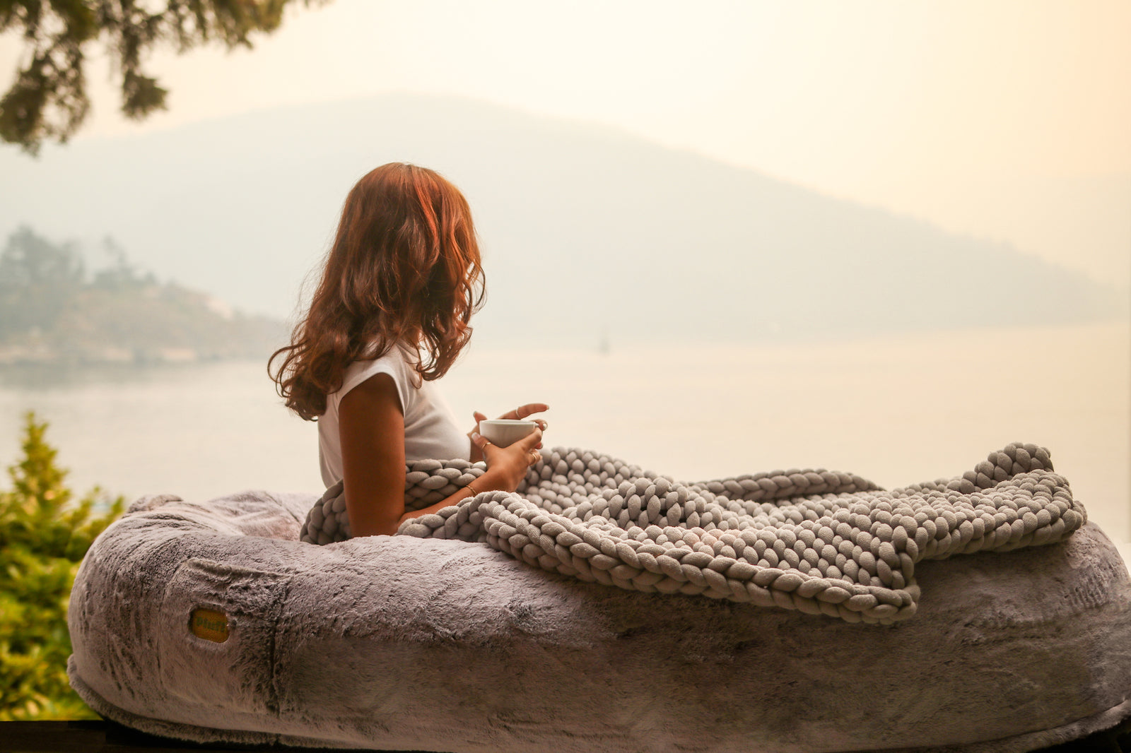 Woman Sleeping At The Plufl Bed