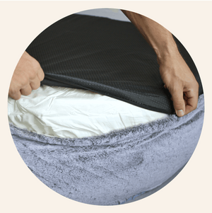 Hands of Man Unzip Plufl: The World's First Dog Bed for Humans