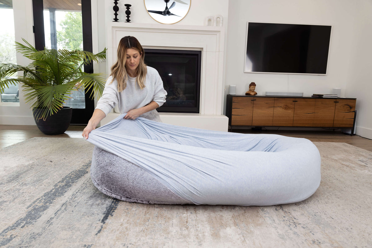 Cooling bamboo fitted sheet on the Plufl Human Dog Bed